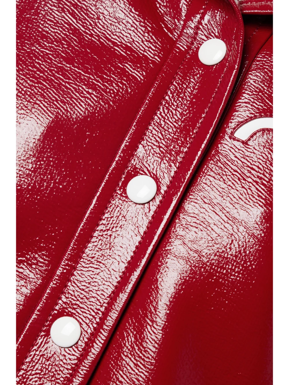 Close-up detail of the Courrèges Reedition Coated Cotton-blend Jacket