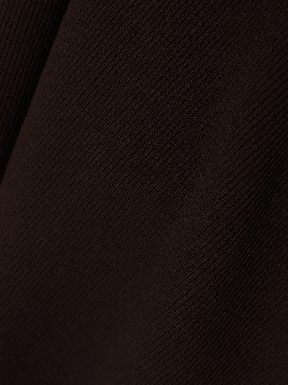 Close-up detail of the Courrèges Undressed Asymmetric Draped Ribbed-knit Midi Dress