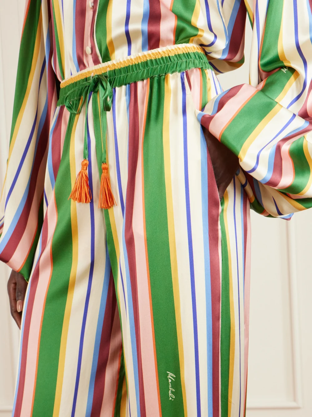Close-up detail of the Cristiano Marcheli Letizia Tasseled Striped Stretch-silk Satin Wide-leg Pants