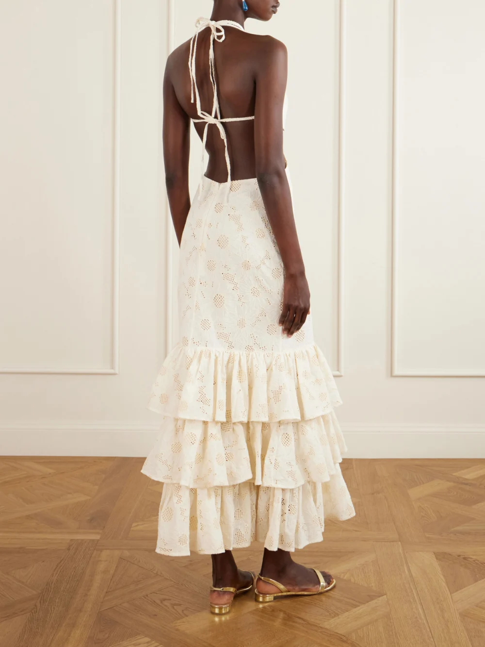 Back view of the Cristiano Marcheli Penelope Open-back Cutout Ruffled Tiered Broderie Anglaise Cotton Maxi Dress