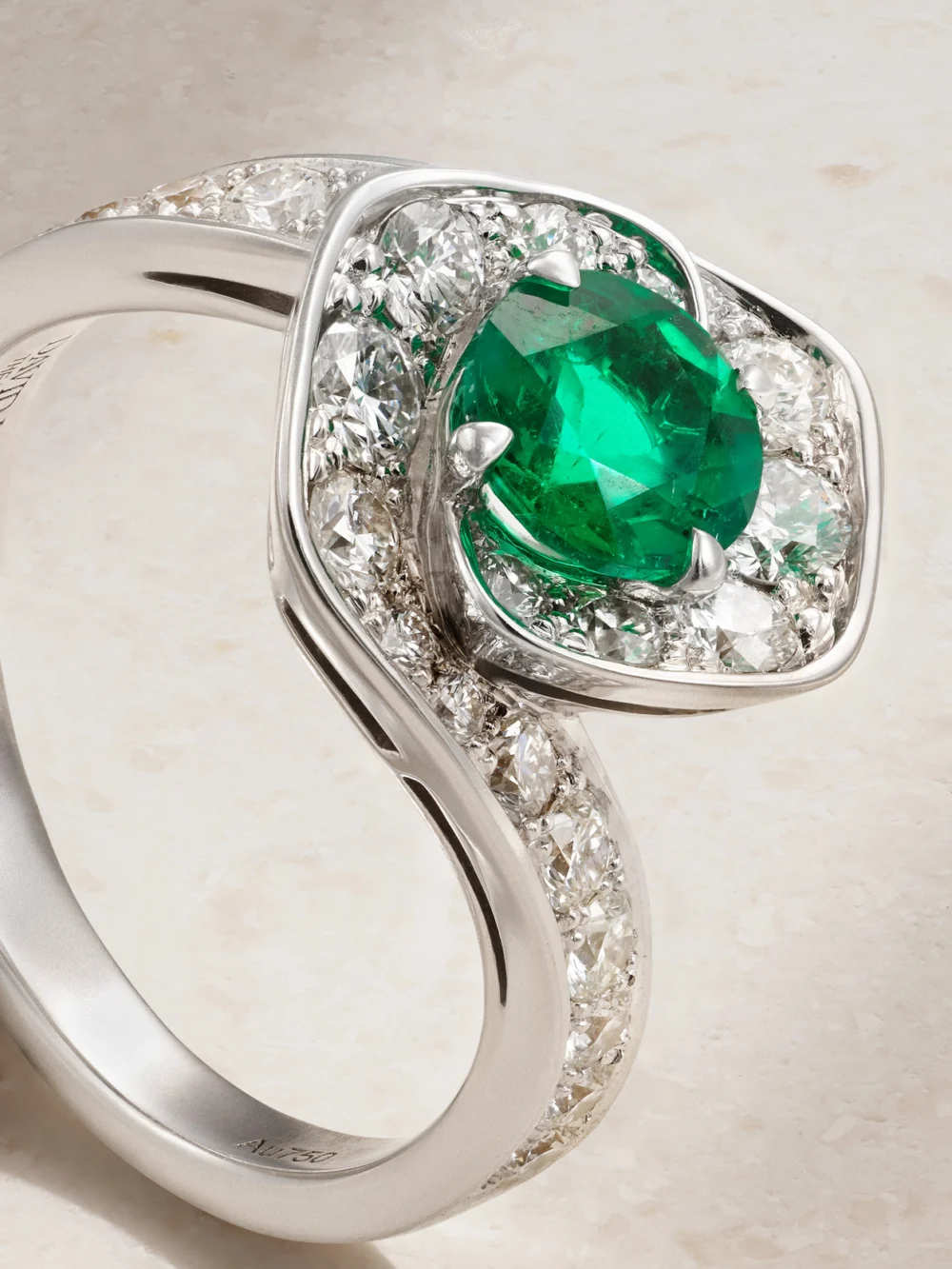Close-up detail of the David Morris Frozen Kiss 18-karat White Gold, Diamond and Emerald Ring