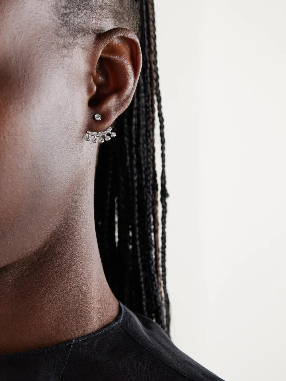 De Beers London Dewdrop Jacket 18-karat White Gold Diamond Earrings, styled view