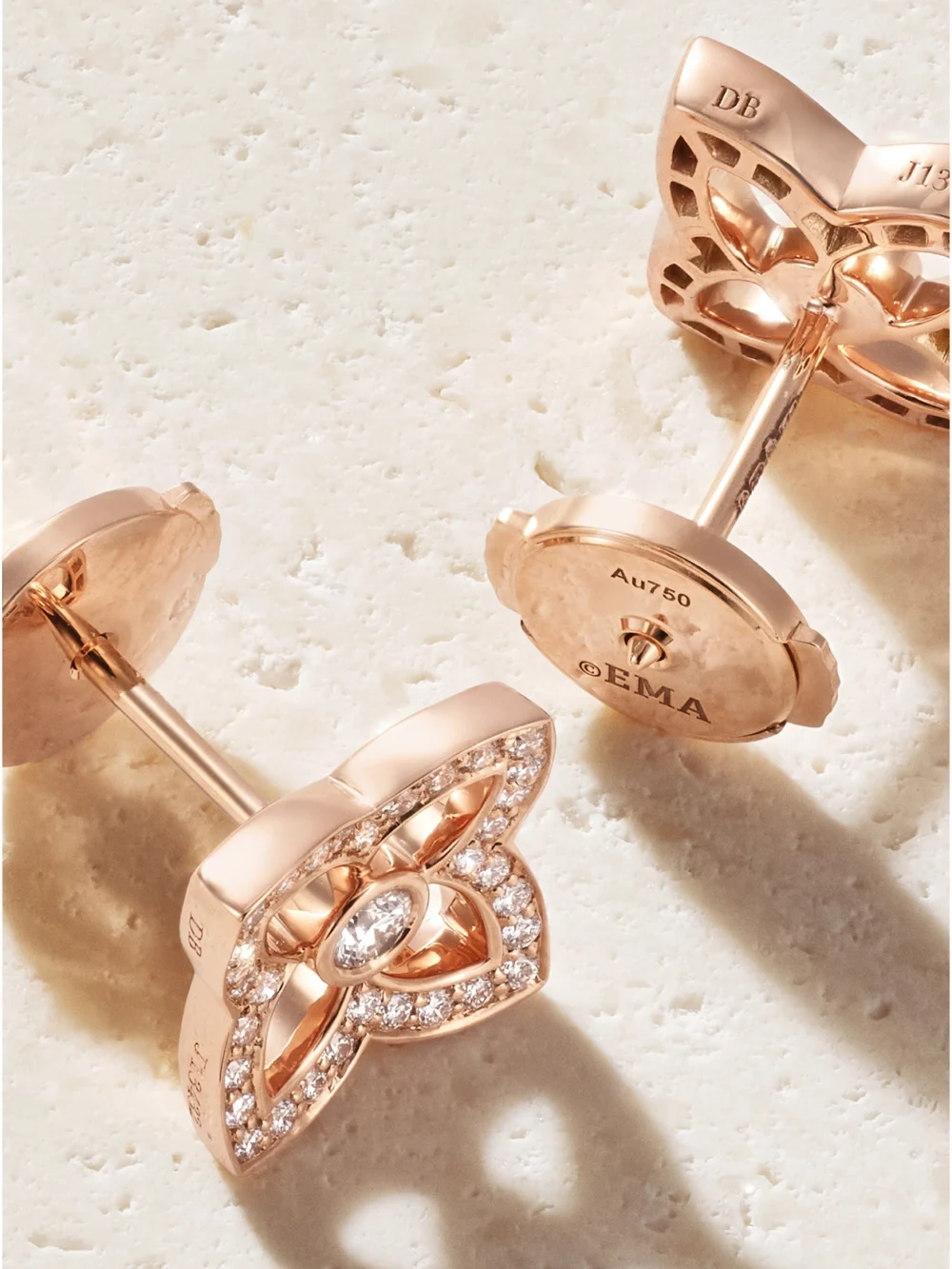 Close-up detail of the De Beers London Lotus By De Beers 18-karat Rose Gold Diamond Earrings
