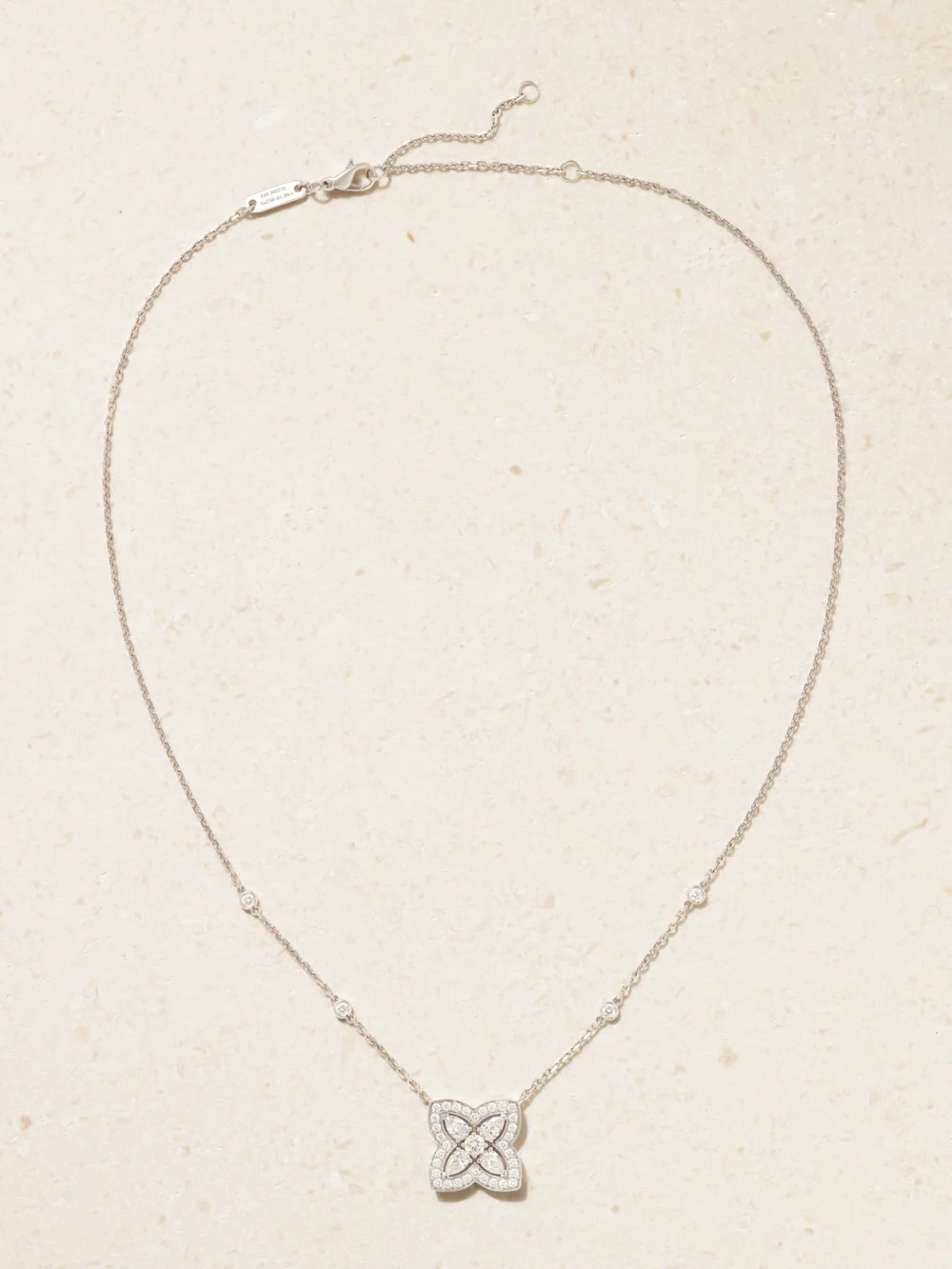 Close-up detail of the De Beers London Lotus By De Beers 18-karat White Gold Diamond Necklace