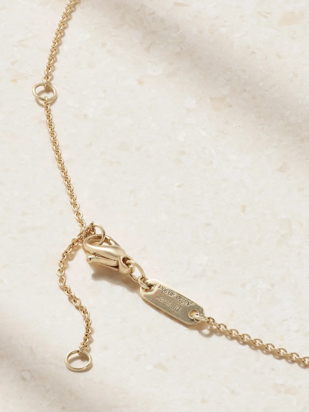 Back view of the De Beers London Talisman Medal 18-karat Gold Diamond Necklace