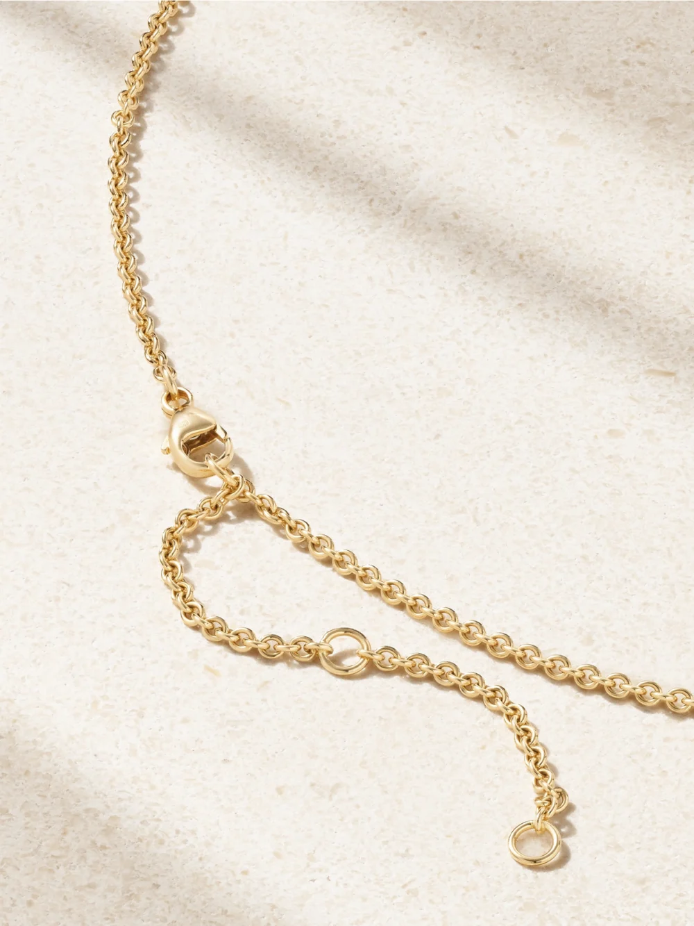 Back view of the De Beers London Talisman Medal Large 18-karat Gold Diamond Necklace