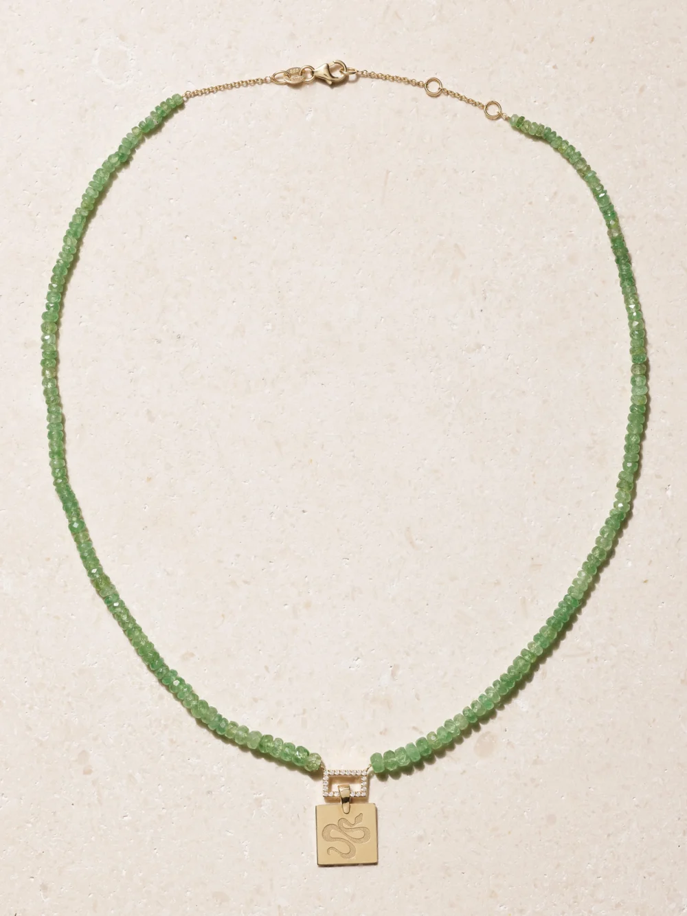 Close-up detail of the Diane Kordas Snake 14-karat Gold, Tsavorite and Diamond Necklace