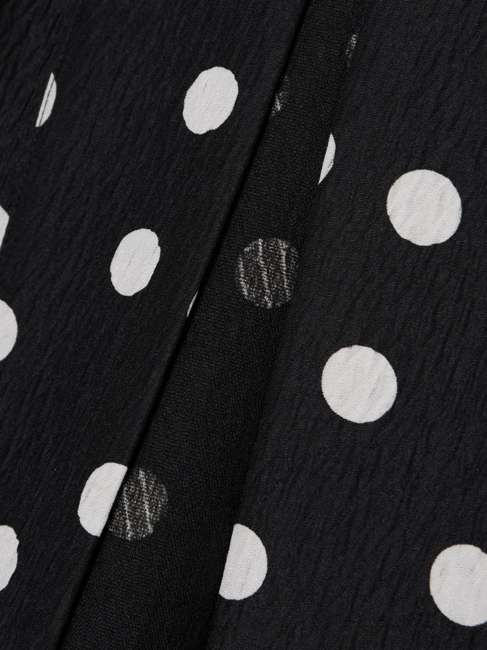 Close-up detail of the Dima Ayad Belted Polka-dot Textured-crepe Jacket