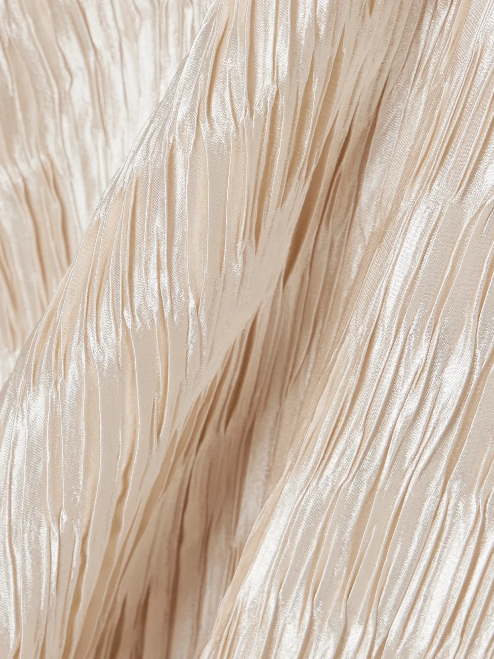 Close-up detail of the Dima Ayad Cocoon Checked Plissé-satin Gown
