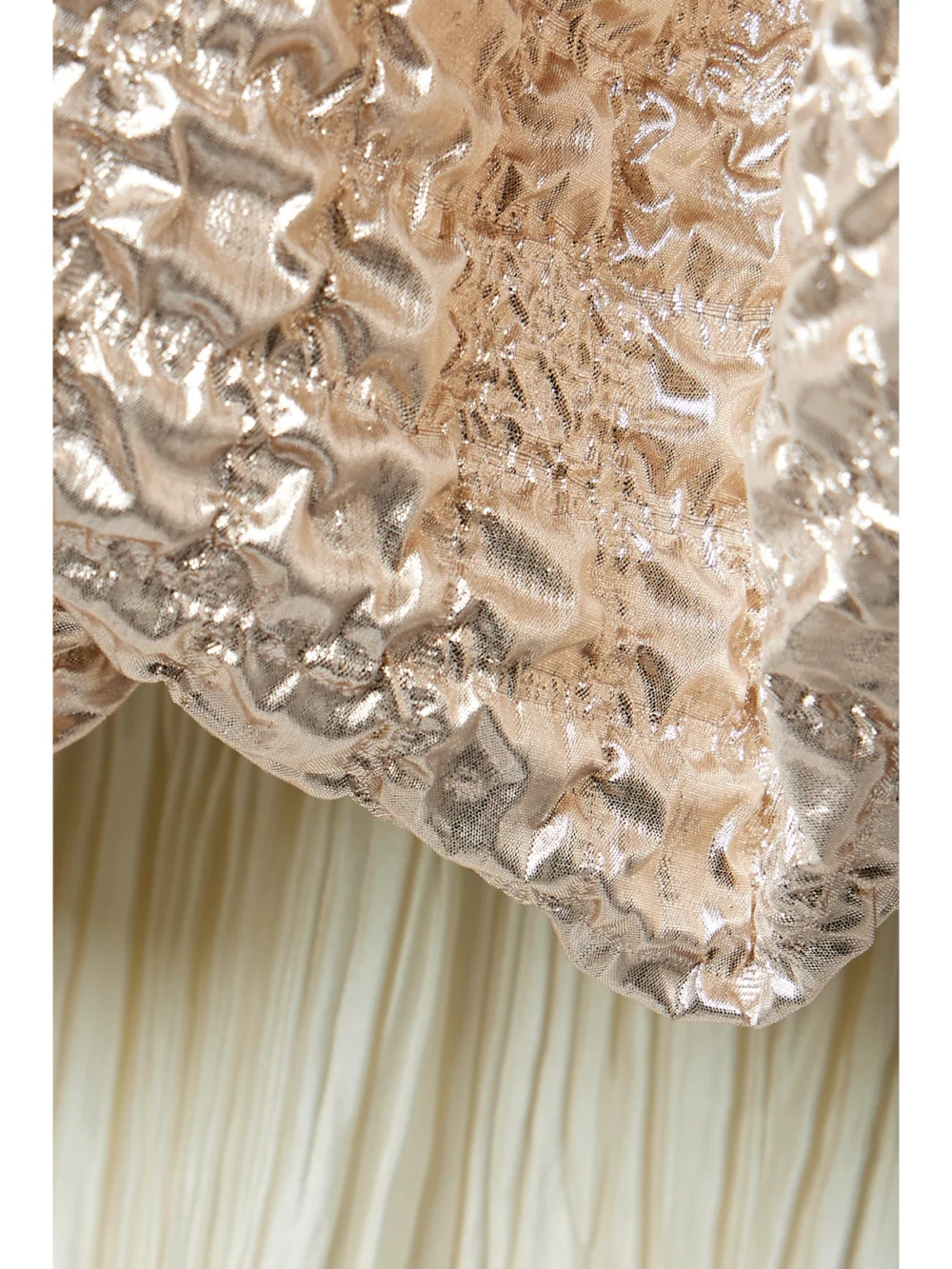 Close-up detail of the Dima Ayad Convertible Popcorn Lamé and Plissé-crepe Gown