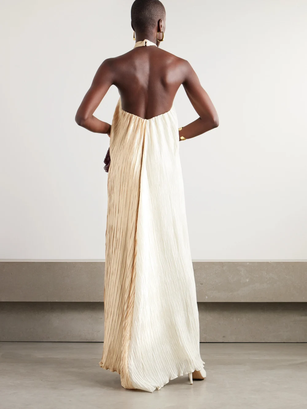 Back view of the Dima Ayad Knotted Plissé-satin Halterneck Maxi Dress