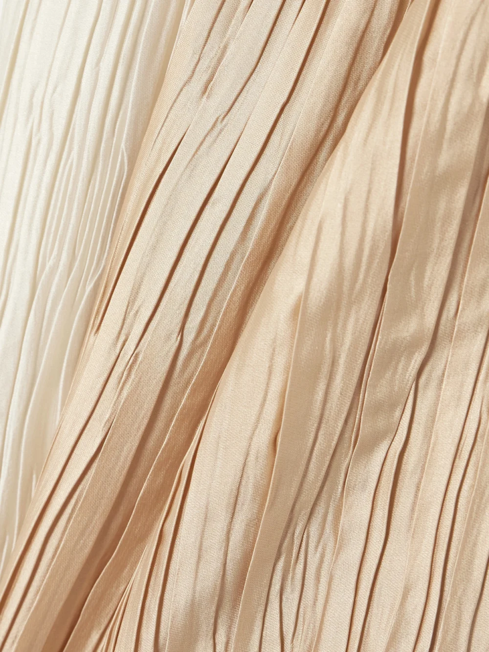 Close-up detail of the Dima Ayad Knotted Plissé-satin Halterneck Maxi Dress
