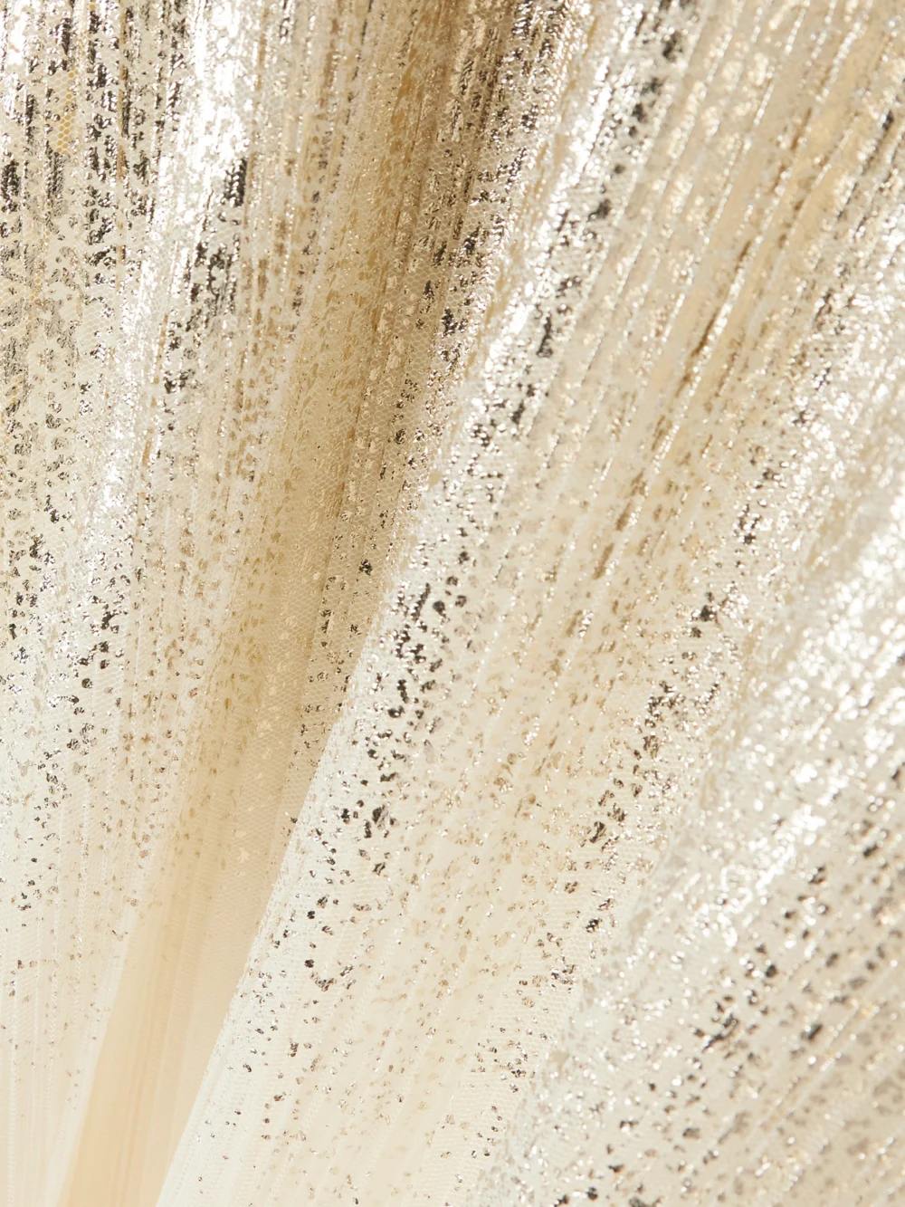 Close-up detail of the Dima Ayad Metallic Plissé-tulle Gown and Cape Set