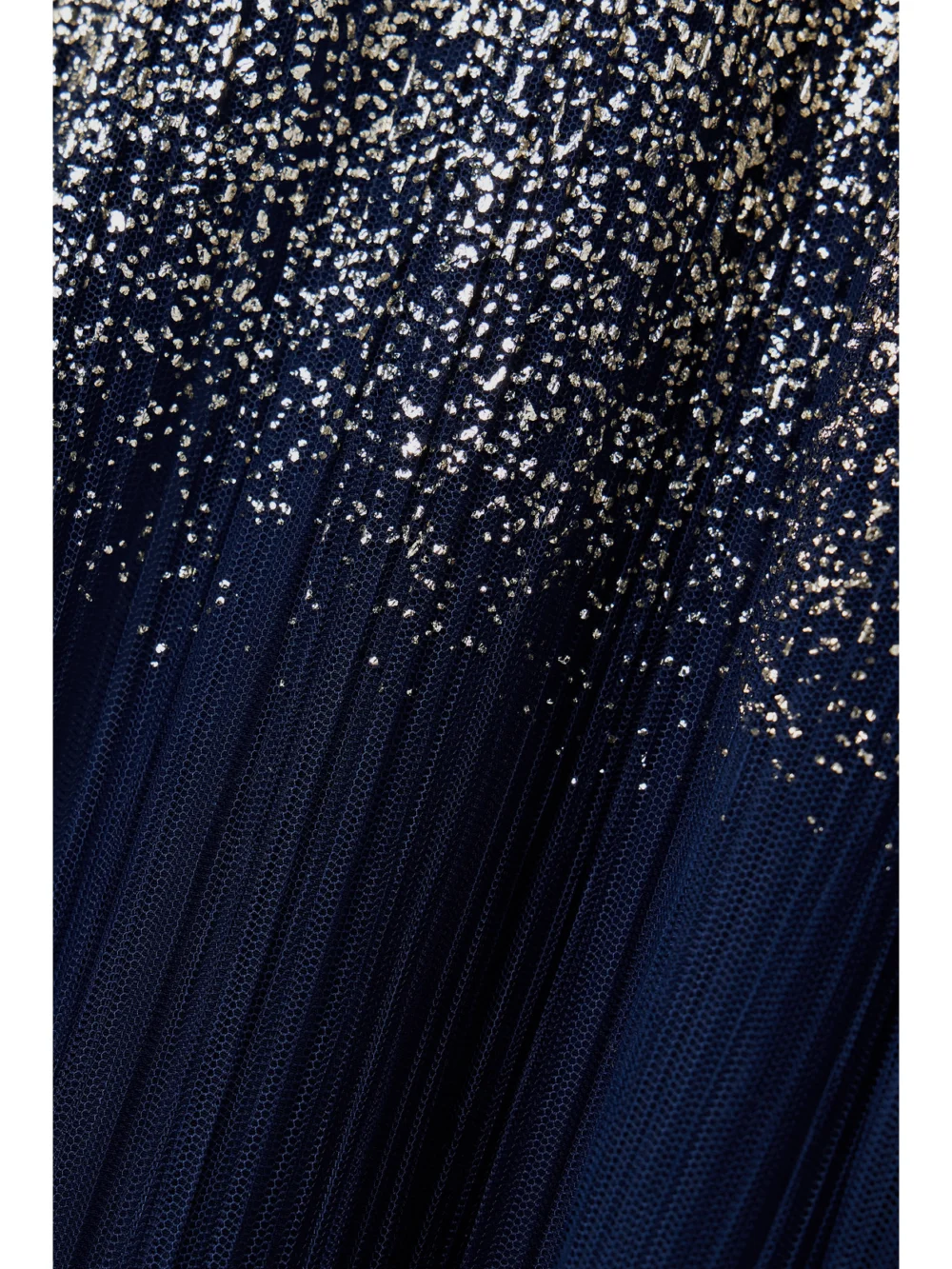 Close-up detail of the Dima Ayad Metallic Plissé-tulle Gown and Cape Set