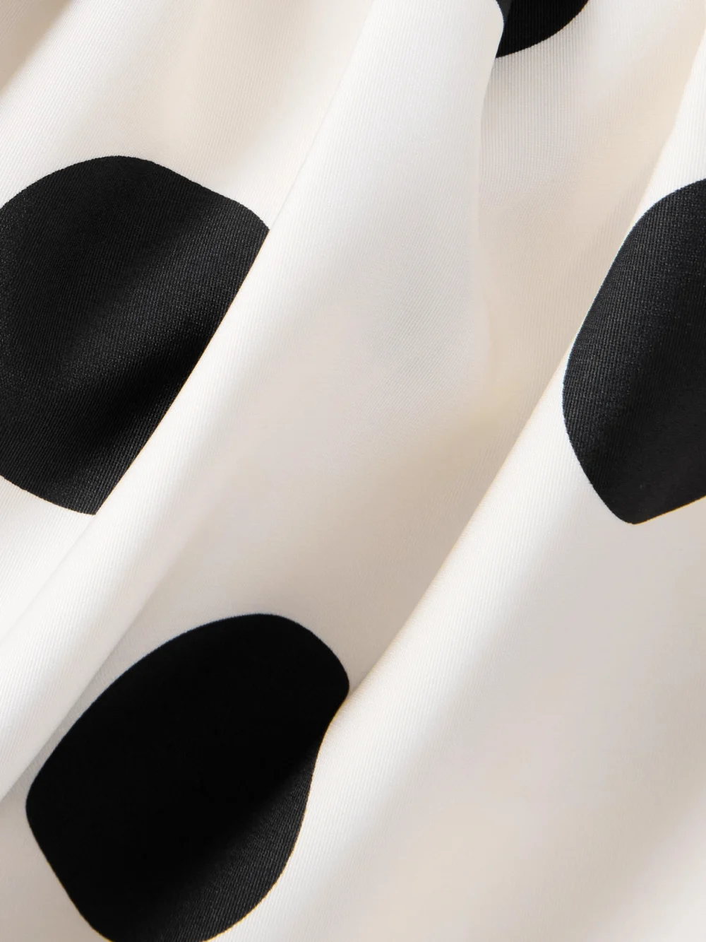 Close-up detail of the Dima Ayad One-shoulder Sequined Polka-dot Faille Maxi Dress
