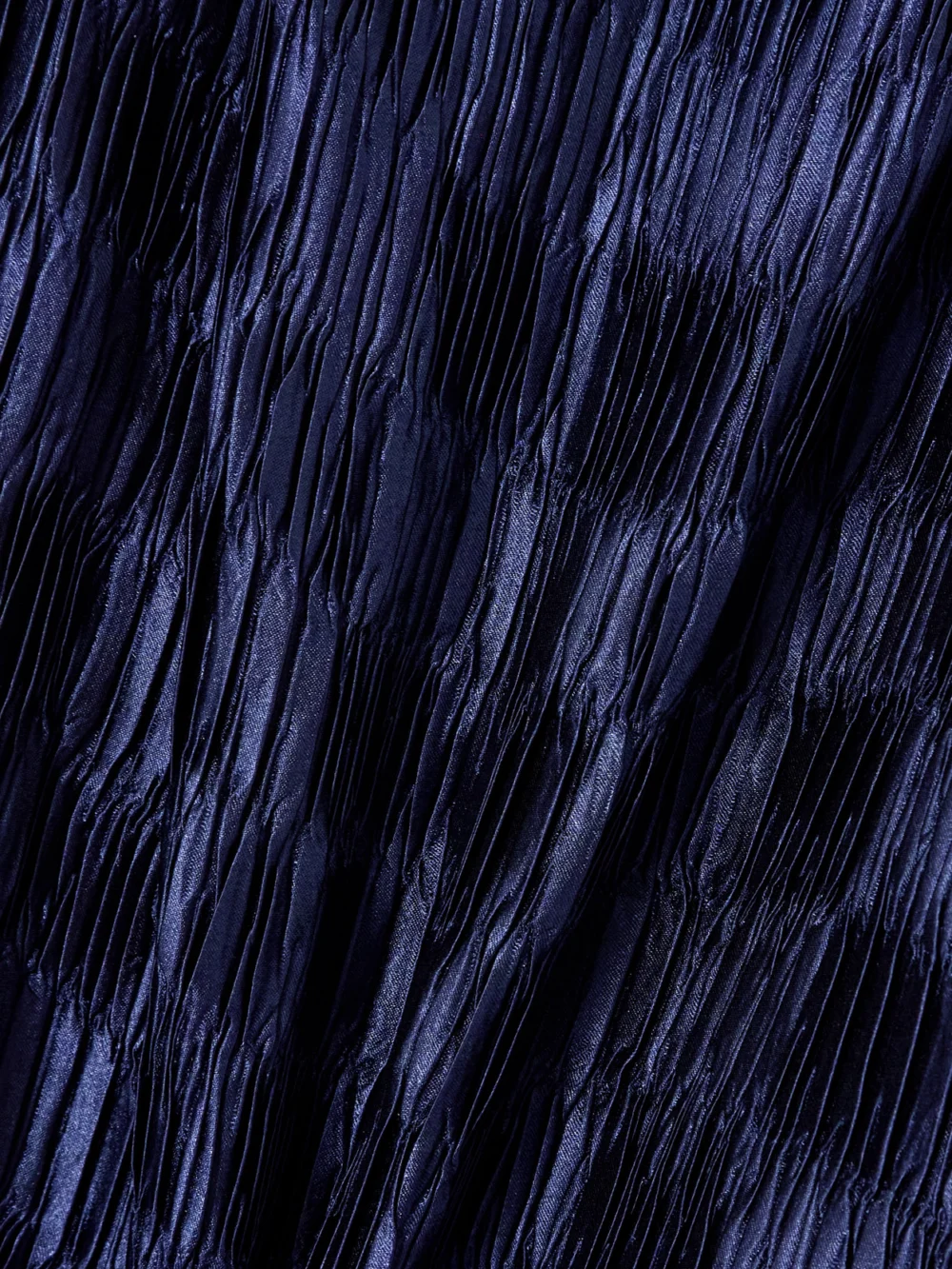 Close-up detail of the Dima Ayad Plissé-satin Halterneck Top