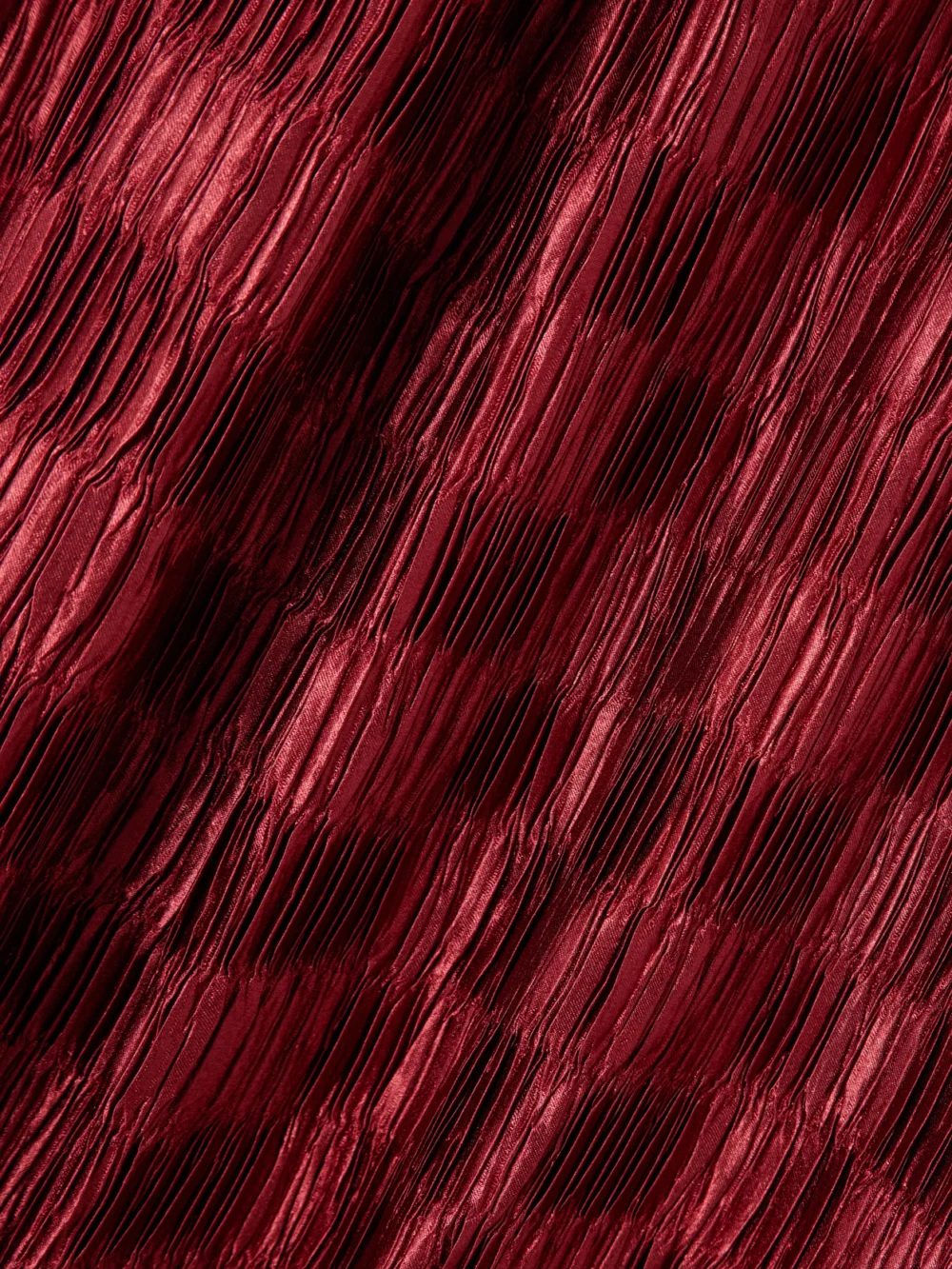 Close-up detail of the Dima Ayad Plissé-satin Wide-leg Pants
