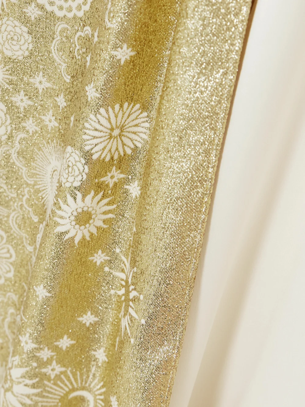 Close-up detail of the Dima Ayad Satin and Metallic Jacquard Satin Gown and Cape Set