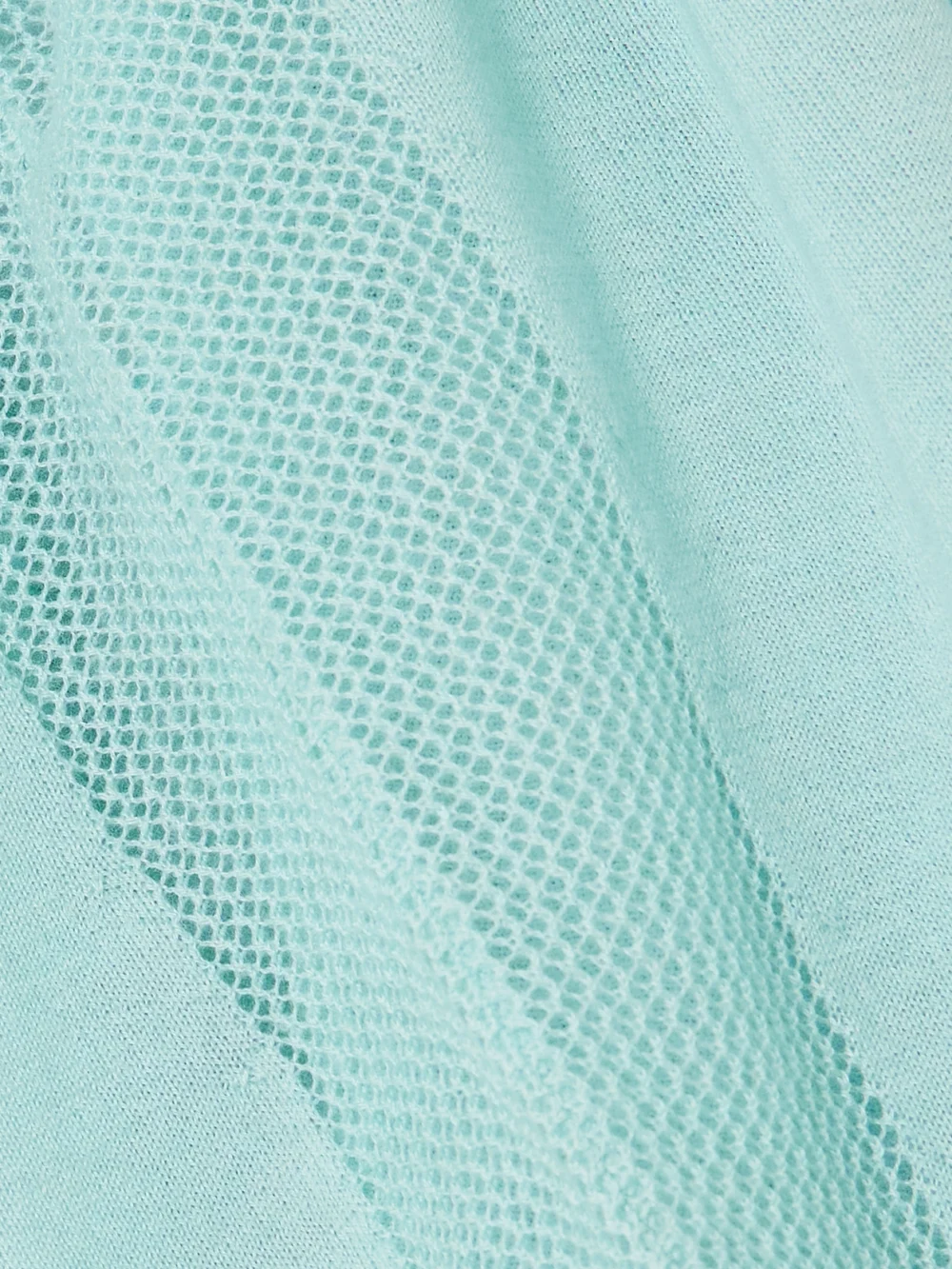 Close-up detail of the Diotima Barton Pointelle-knit Cashmere Henley Sweater