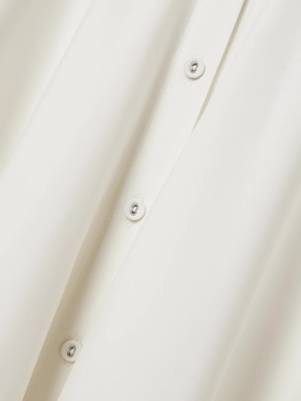 Close-up detail of the Diotima Lewis Crocheted Cotton-trimmed Wool Maxi Shirt Dress