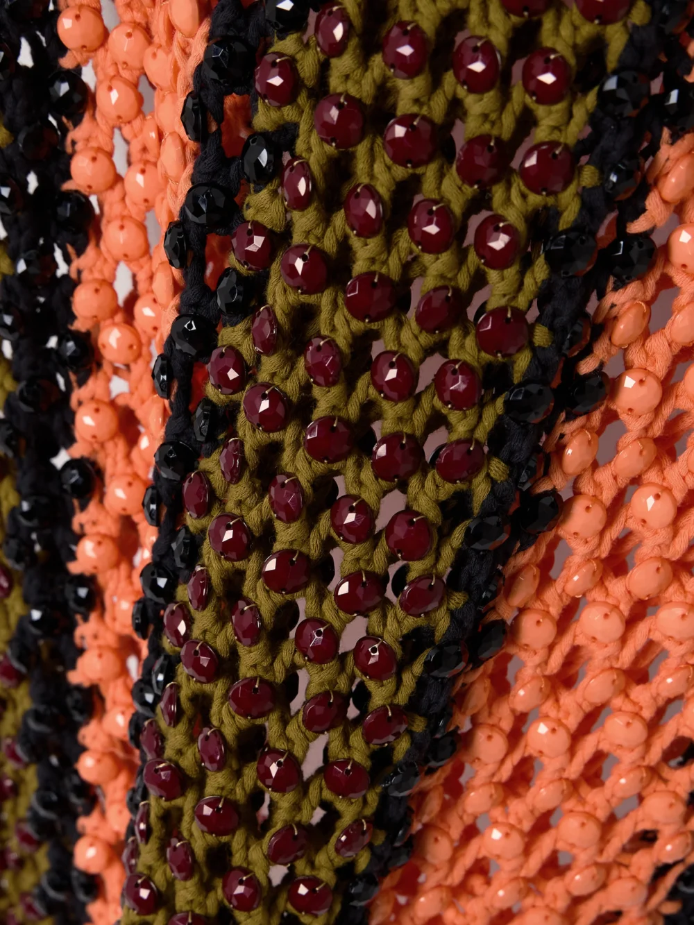 Close-up detail of the Diotima Spice Beaded Striped Knitted Cotton-blend Maxi Skirt
