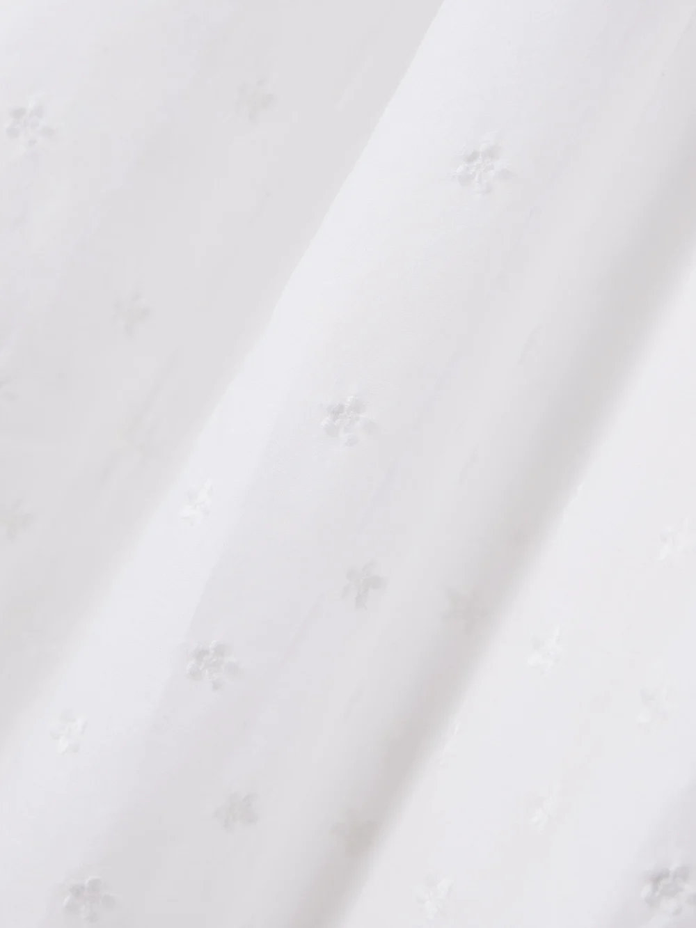 Close-up detail of the Dôen Lelia Embroidered Lace-trimmed Organic Cotton-voile Nightdress
