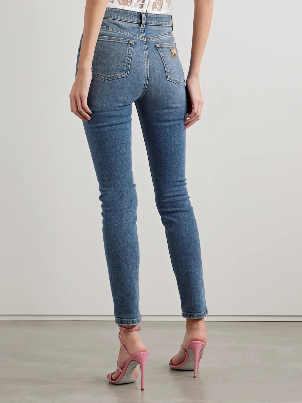Back view of the Dolce & Gabbana Appliquéd High-rise Skinny Jeans