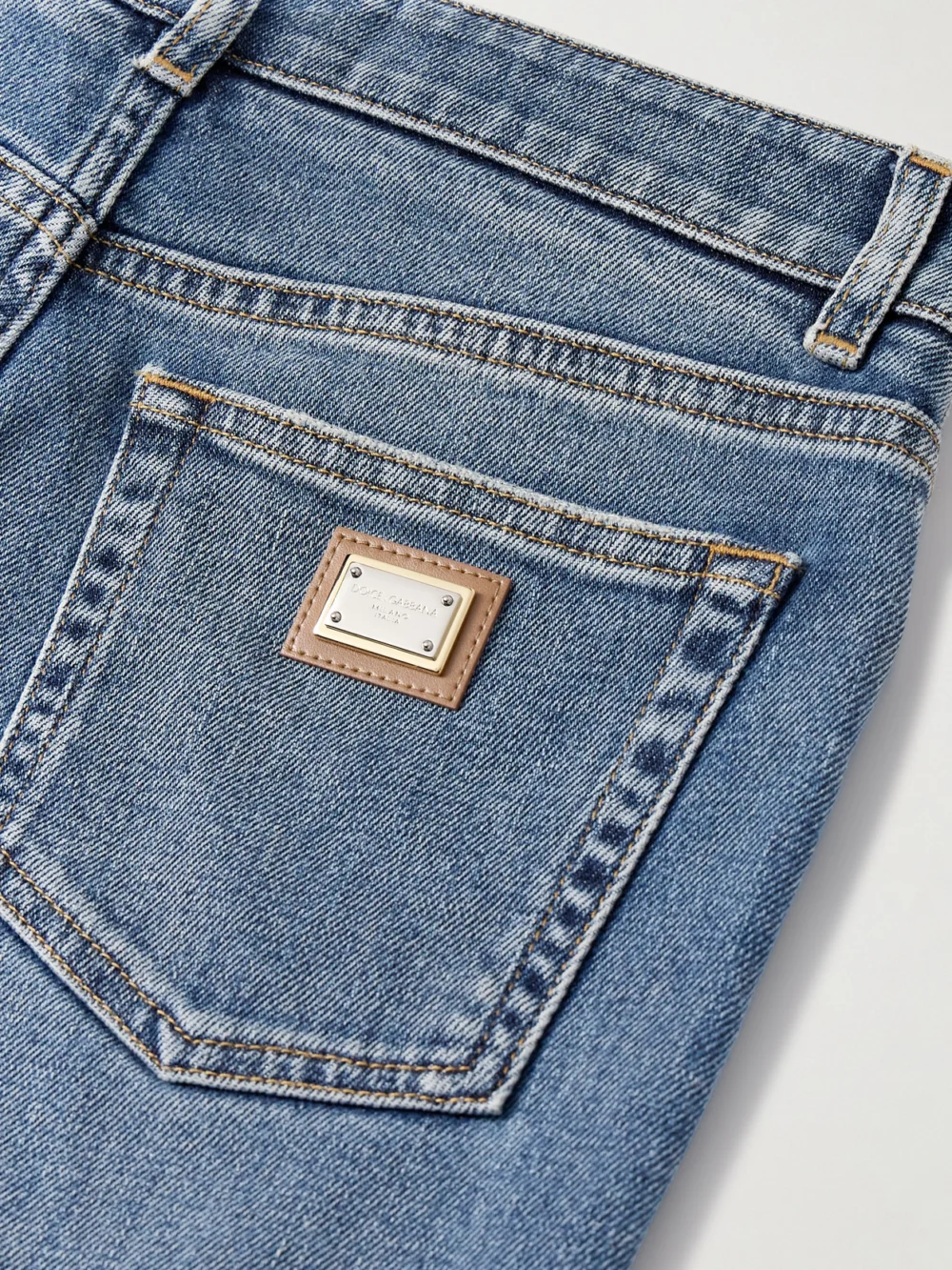 Close-up detail of the Dolce & Gabbana Appliquéd High-rise Skinny Jeans