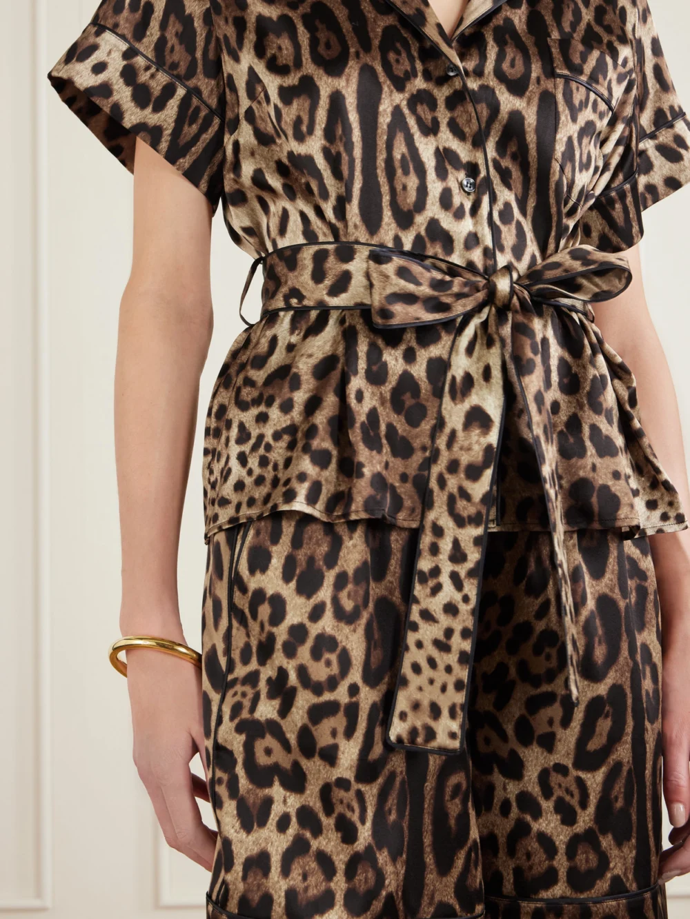 Close-up detail of the Dolce & Gabbana Belted Piped Leopard Print Silk-blend Satin Shirt