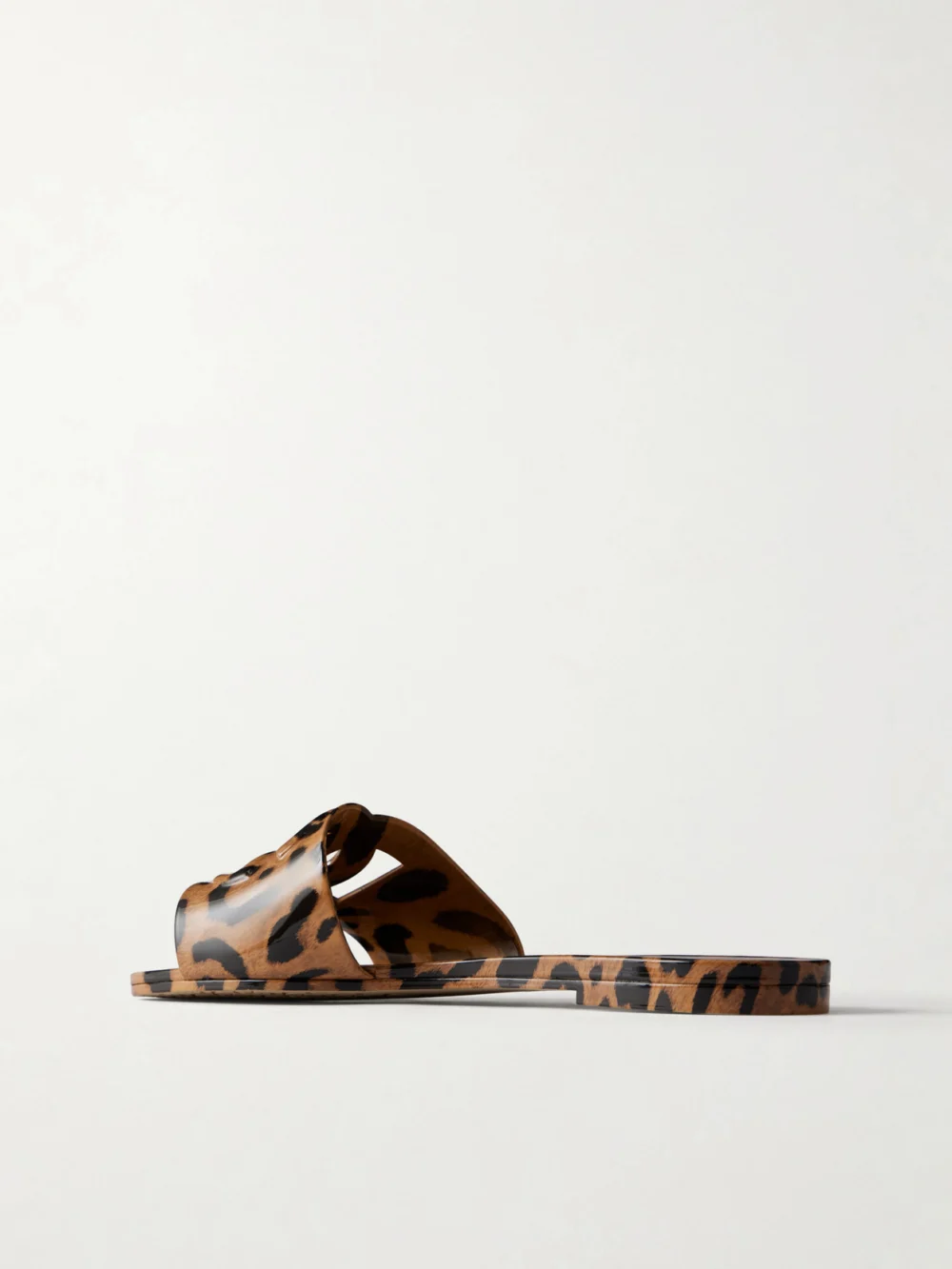 Back view of the Dolce & Gabbana Bianca Logo-embossed Leopard-print Rubber Flats