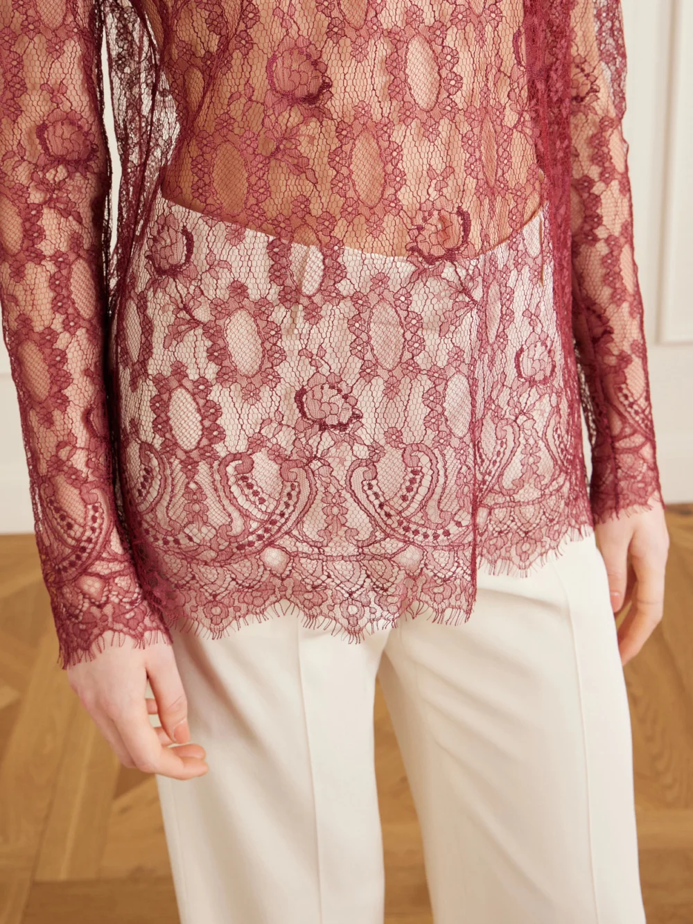 Close-up detail of the Dolce & Gabbana Chantilly Lace Turtleneck Blouse