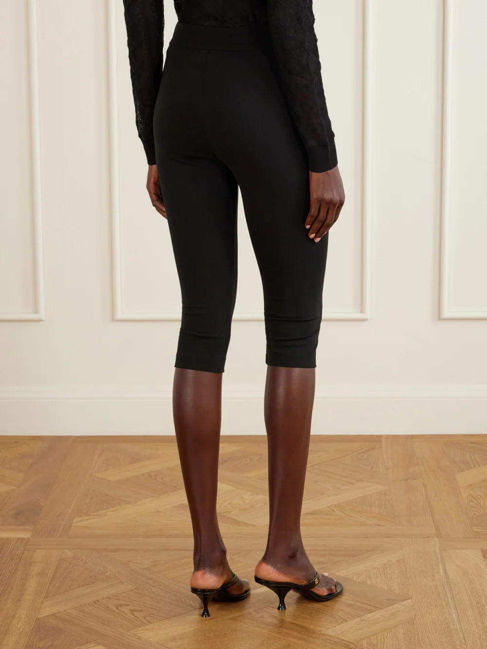 Back view of the Dolce & Gabbana Crepe High-rise Straight-leg Capri Pants