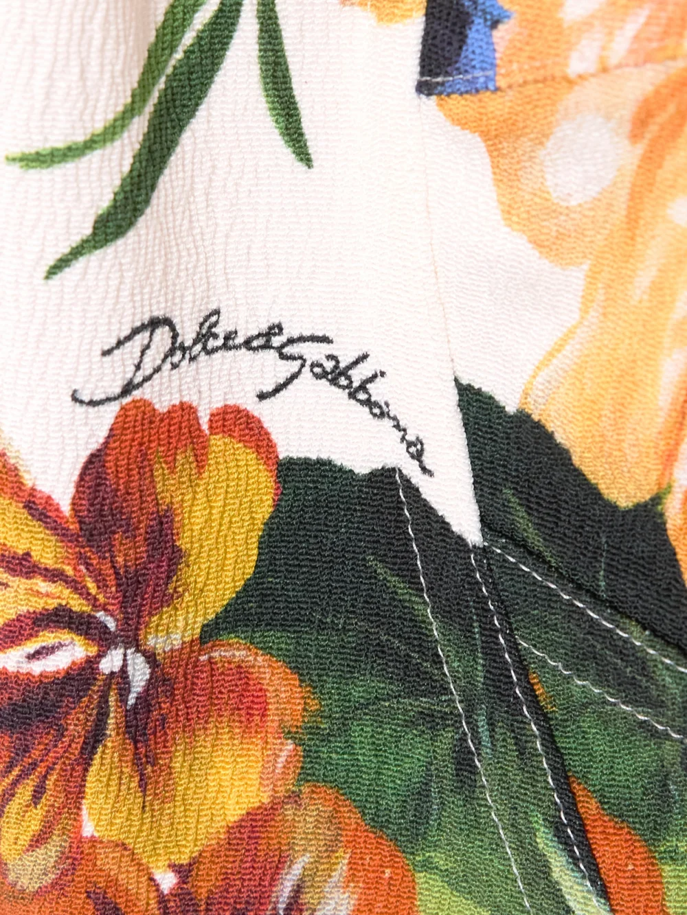 Close-up detail of the Dolce & Gabbana Cropped Poplin-trimmed Floral-print Crepon Bustier Top