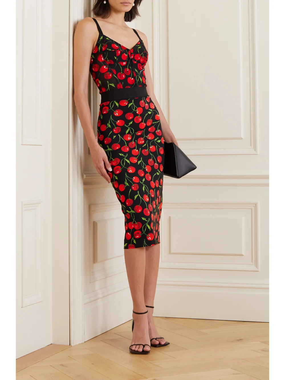 Dolce & Gabbana Cropped Printed Stretch-tulle Bustier Top, worn by a model