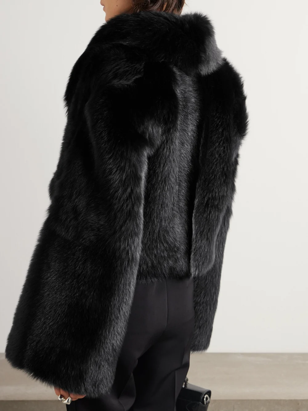 Back view of the Dolce & Gabbana Cropped Satin-trimmed Shearling Jacket