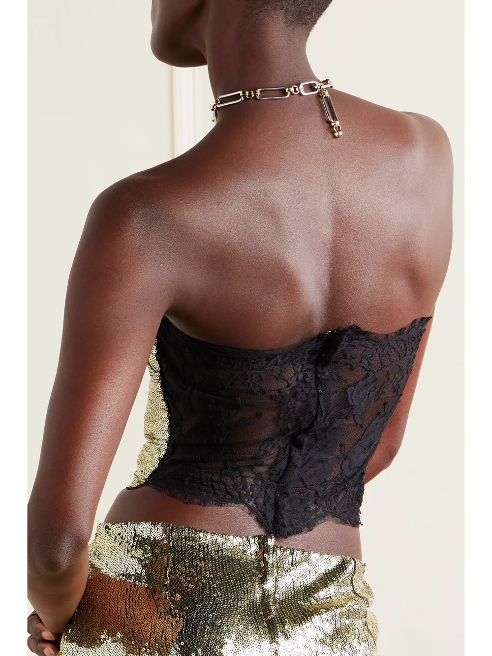 Back view of the Dolce & Gabbana Cropped Strapless Lace and Sequined Tulle Bustier Top