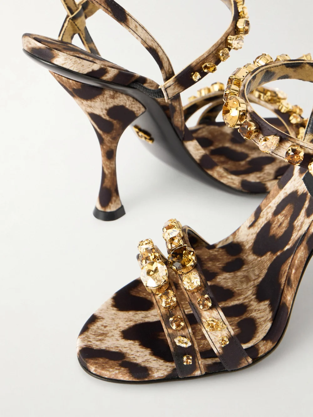 Close-up detail of the Dolce & Gabbana Crystal-embellished Leopard-print Satin Sandals