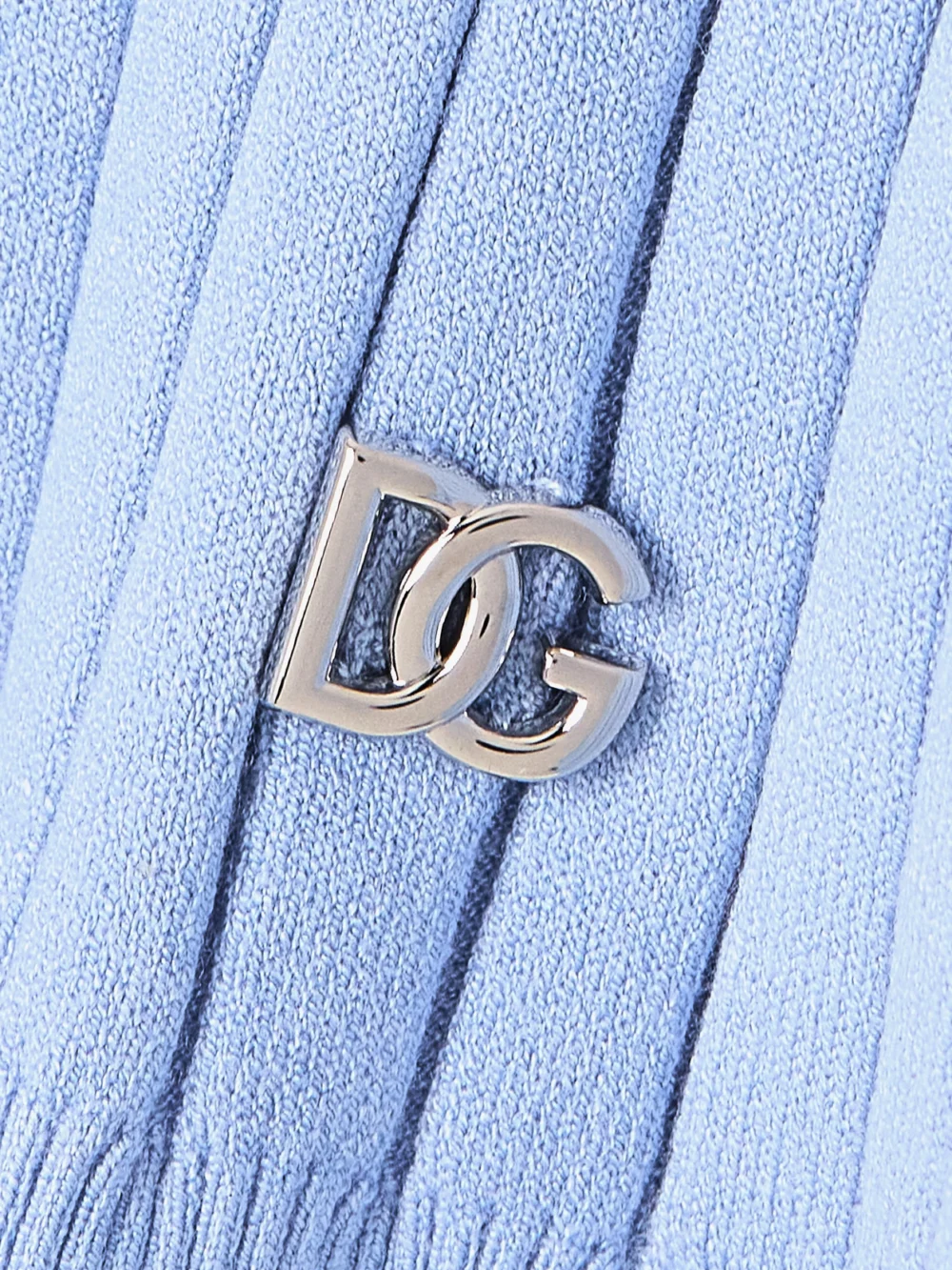 Close-up detail of the Dolce & Gabbana Embellished Ribbed-knit Polo Shirt