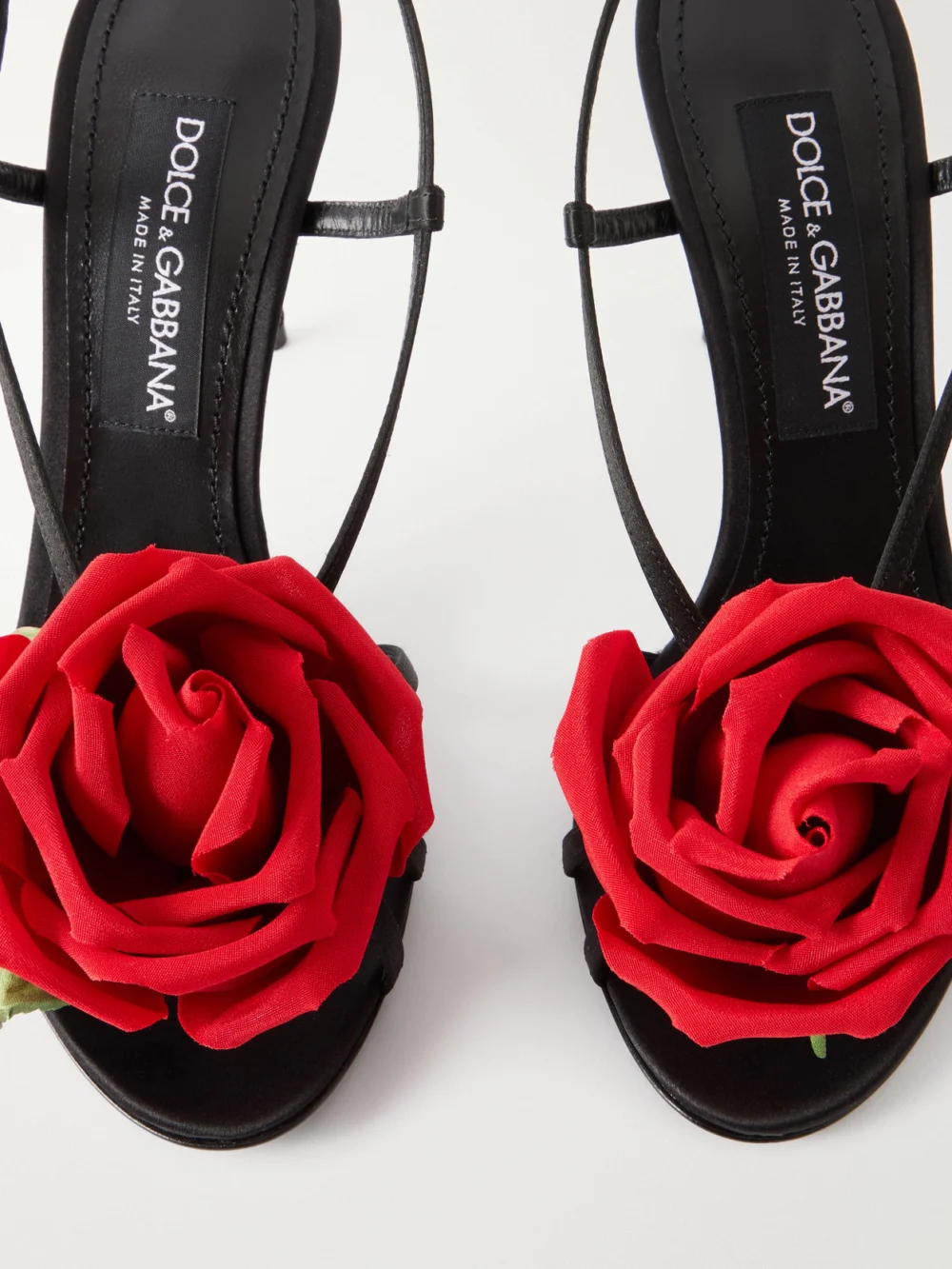 Close-up detail of the Dolce & Gabbana Floral-appliqué Satin Sandals