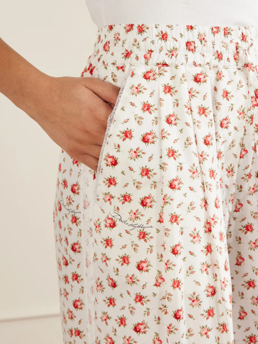 Close-up detail of the Dolce & Gabbana Floral-print Cotton-blend Poplin High-rise Wide-leg Pants