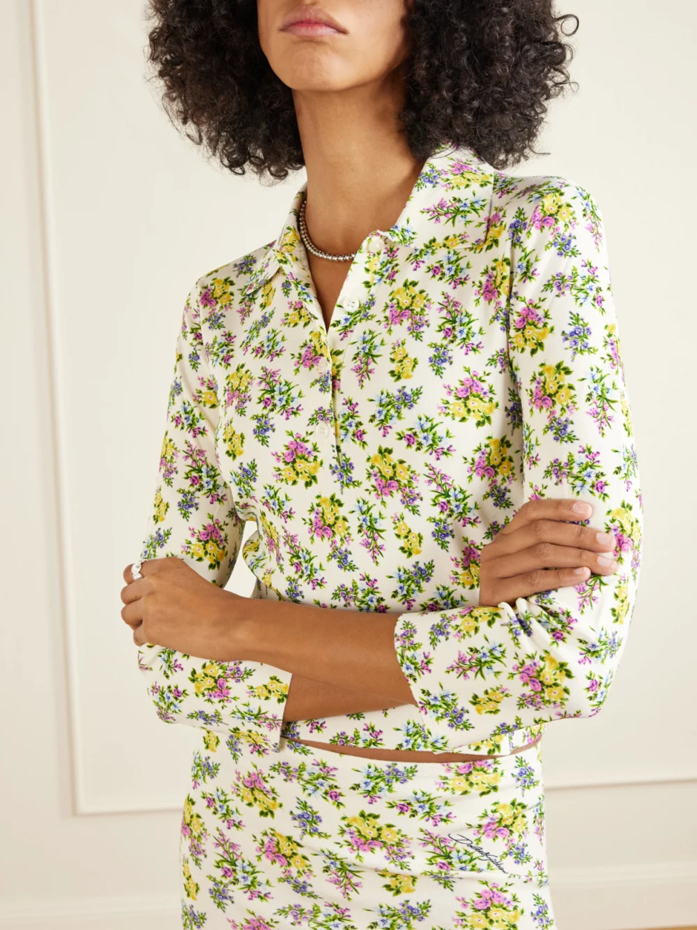 Close-up detail of the Dolce & Gabbana Floral-print Ribbed-knit Polo Shirt