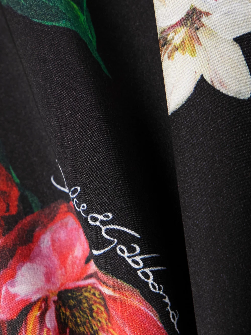 Close-up detail of the Dolce & Gabbana Floral-print Satin Midi Skirt