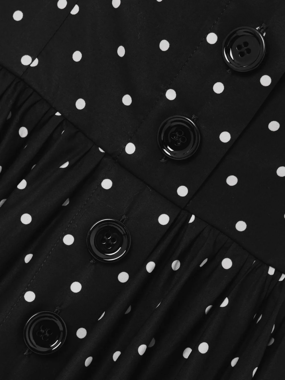 Close-up detail of the Dolce & Gabbana Gathered Polka-dot Cotton-poplin Midi Dress