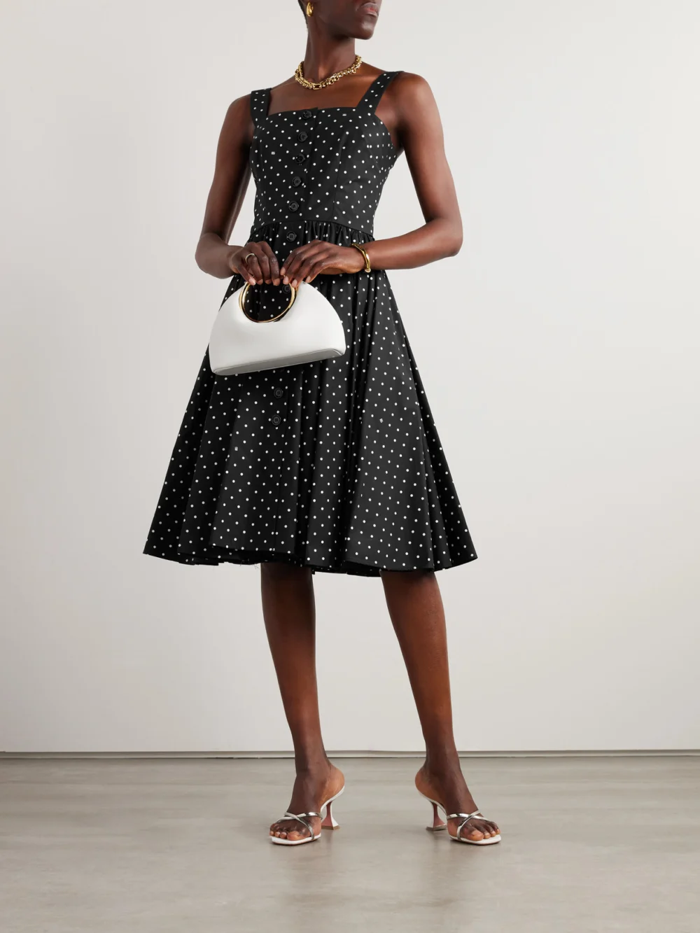 Dolce & Gabbana Gathered Polka-dot Cotton-poplin Midi Dress, worn by a model