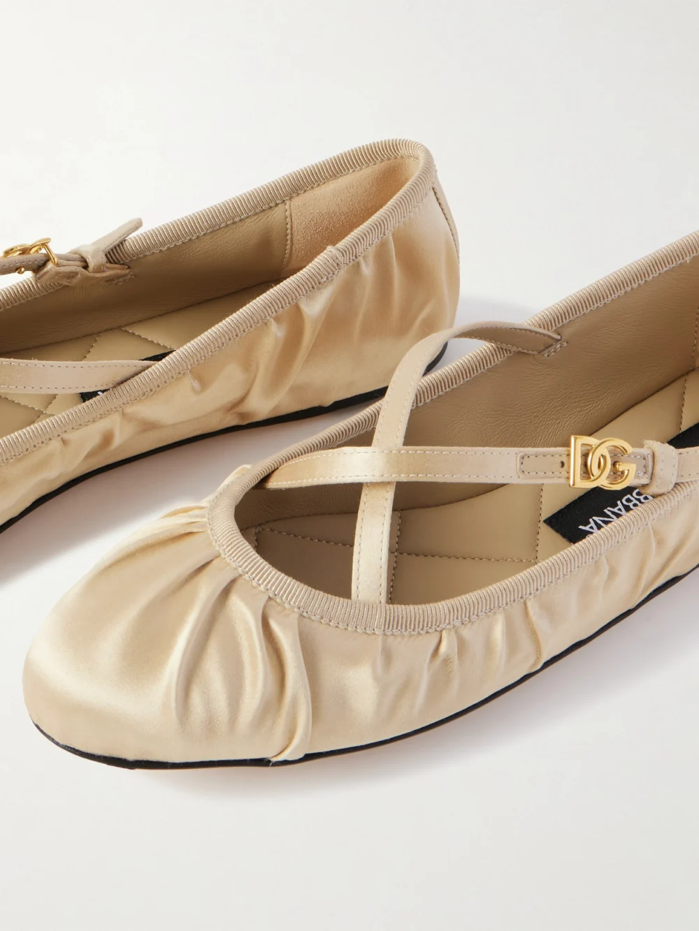 Close-up detail of the Dolce & Gabbana Gathered Satin Mary Jane Ballet Flats