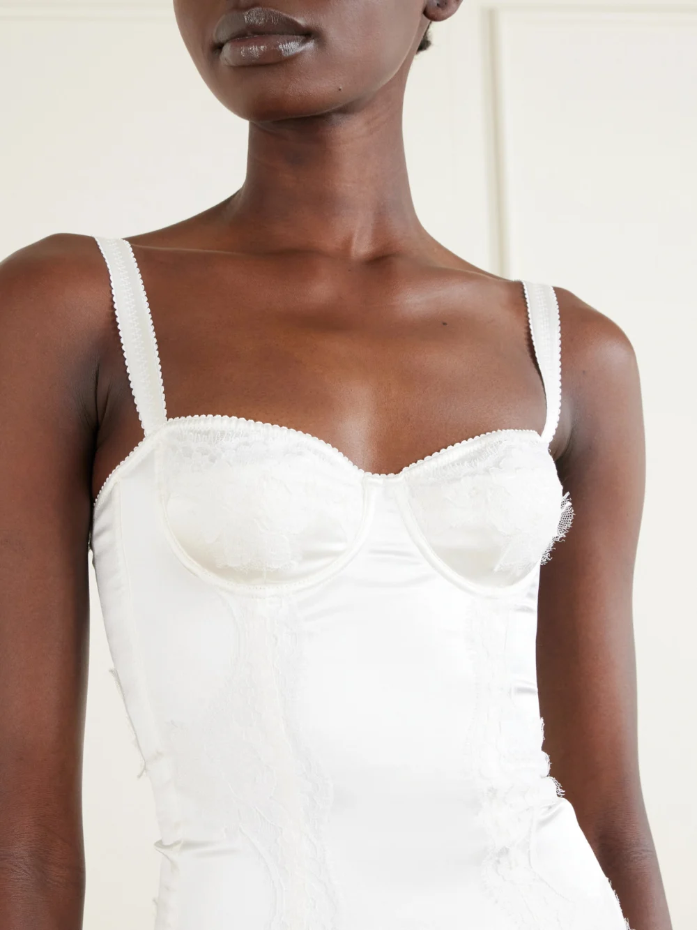 Close-up detail of the Dolce & Gabbana Lace-trimmed Silk-blend Satin Bodysuit