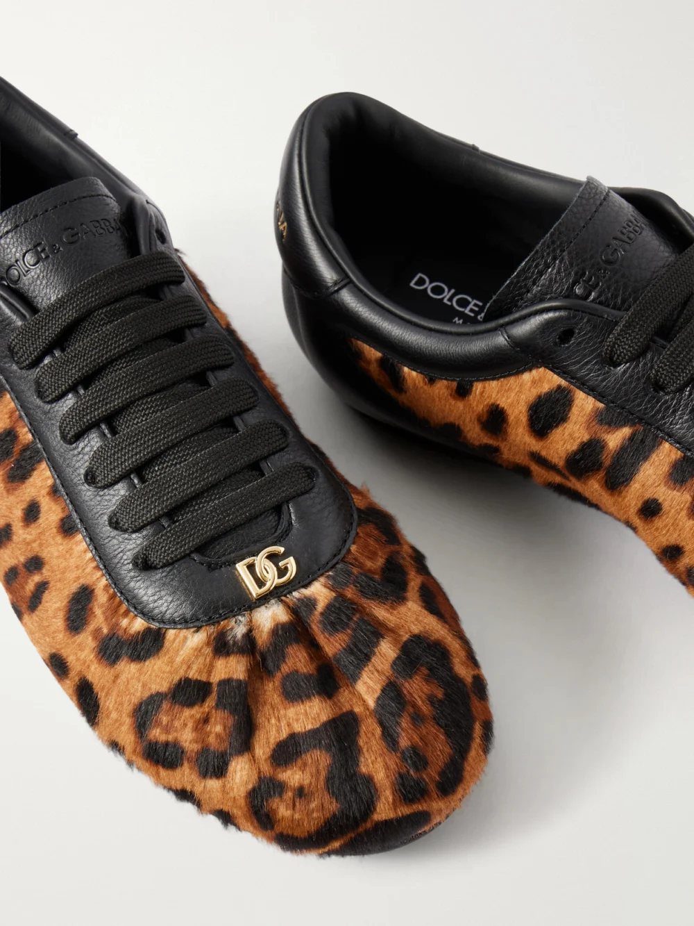 Close-up detail of the Dolce & Gabbana Leather-trimmed Leopard-print Plush Sneakers