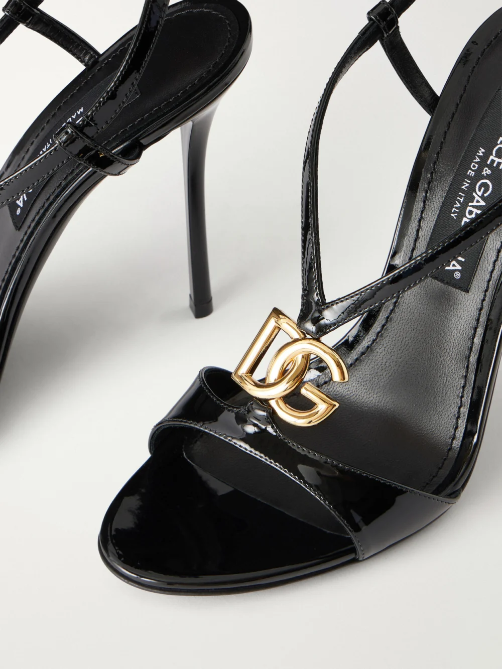 Close-up detail of the Dolce & Gabbana Logo-detailed 105 Patent-leather Sandals