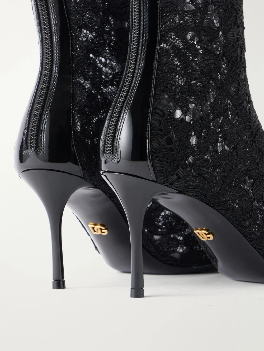 Close-up detail of the Dolce & Gabbana Lollo Leather-trimmed Lace Ankle Boots
