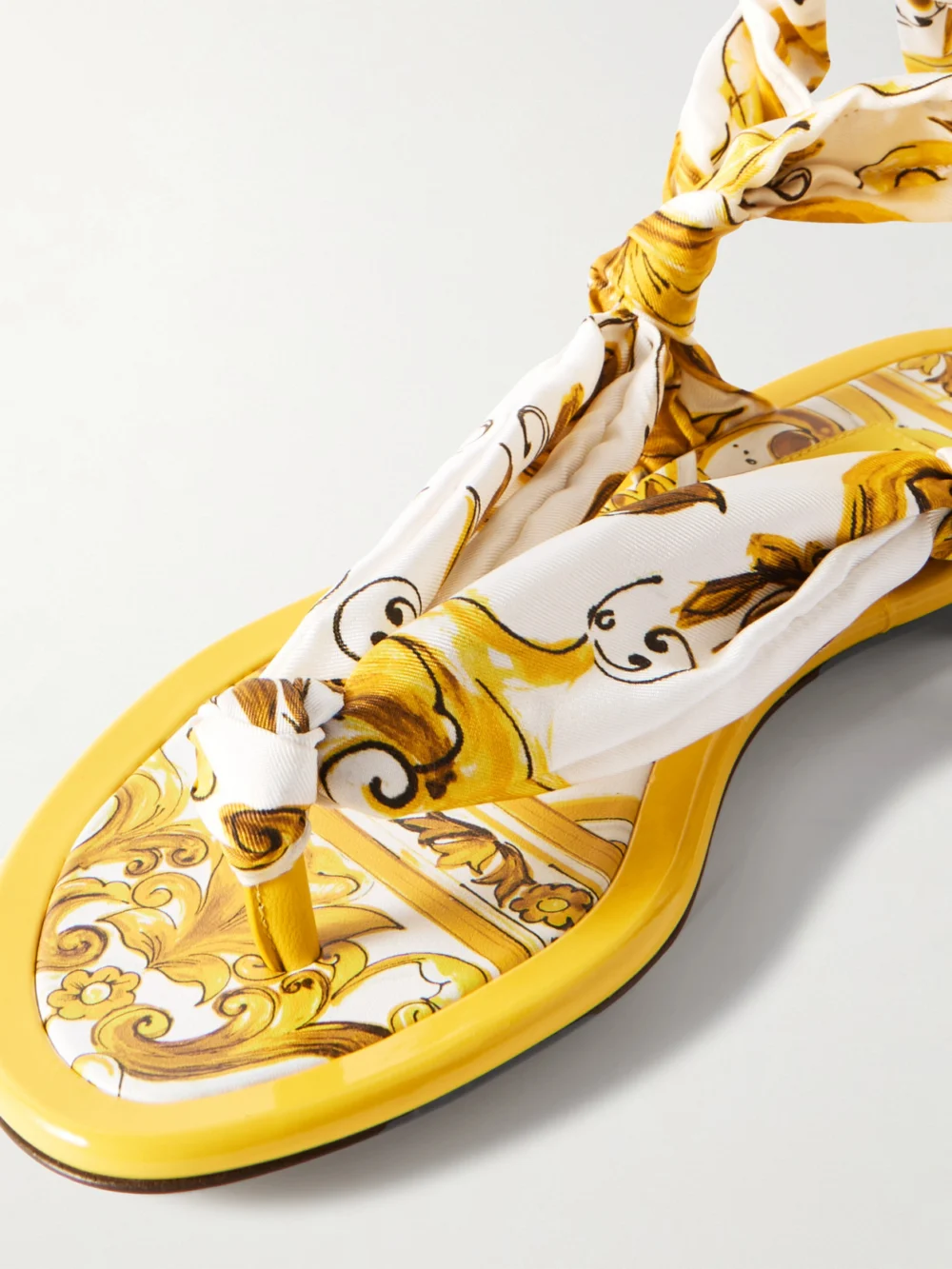 Close-up detail of the Dolce & Gabbana Maiolica Capri Scarf Leather-trimmed Printed Twill Sandals